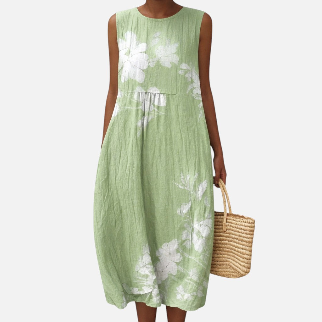 María | Vestido midi sin mangas con flores blancas sobre verde
