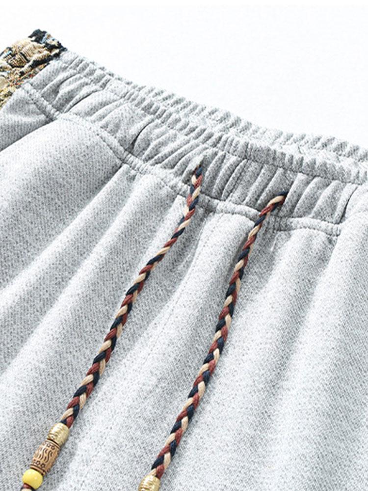 Segismundo | Pantalón de pernera recta con estampado de oso